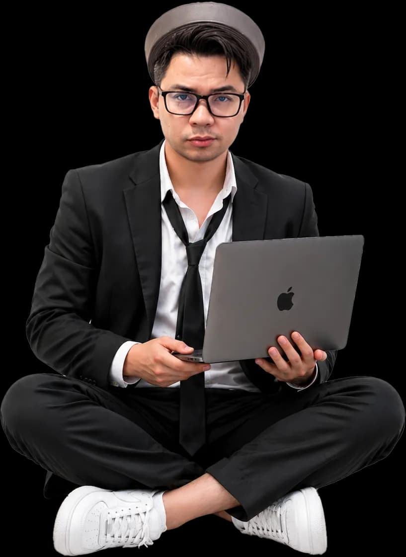 Tuan Nguyen, founder of Beemud, seated with a laptop